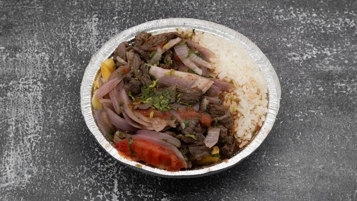 Lomo saltado with rice